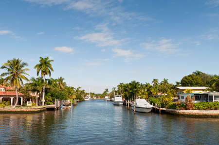 Fort Lauderdale, USA - December 8, 2011: Boats at waterfront homes in Fort Lauderdale. There are 165 miles of waterways within the city limits and 9,8 percent of the city is covered by water.のeditorial素材