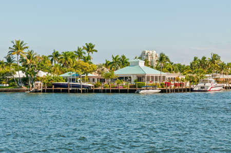 Fort Lauderdale, USA - December 8, 2011: Luxury mansion and boats at waterfront homes in Fort Lauderdale. There are 165 miles of waterways within the city limits and 9,8 percent of the city is covered by water.のeditorial素材