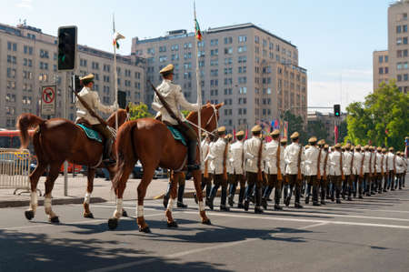 Santiago, Chile - December 2, 2012: Ceremonial changing of the guard at Palacio de la Moneda in Santiago, Chile. The palace was opened in 1805 as a colonial mint, but later became the presidential palace.のeditorial素材