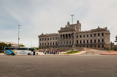 Montevideo, Uruguay - December 15, 2012: Tourists in front of the facade of the Parliament of Uruguay, Montevideo, Uruguay.のeditorial素材