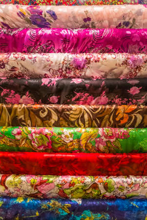 Beijing, China - October 14, 2013: A selection of silk fabrics viewed vendor in Beijing, China.のeditorial素材