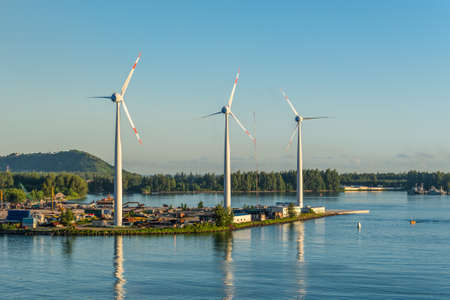 Victoria, Mahe island, Seychelles - December 15, 2015: Wind turbines producing clean electricity at dawn in Victoria, Mahe Island, Seychelles.のeditorial素材