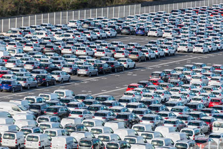 Le Port, Reunion island, France - December 24, 2015: Rows of new cars parked in port platform of the...