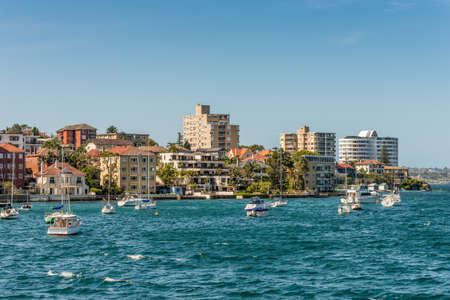 Manly, Australia - November 9, 2014: Sailboats moored in the Manly district bay on Summer day, near Sydney, Australia. Manly is a beach-side suburb of northern Sydney, in the state of New South Wales, Australia.のeditorial素材