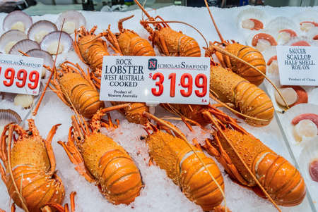 Sydney, Australia - November 11, 2014: Fresh Rock Lobster on ice in the Famous Sydney Fish Market, Sydney, New South Wales, Australia.. 52 tonnes of seafood are selling at auction on this market every day.のeditorial素材