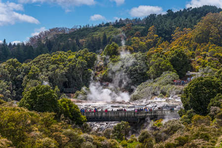 Rotorua, New Zealand - November 20, 2014: People watching Pohutu Geyser in Rotorua, New Zealandのeditorial素材