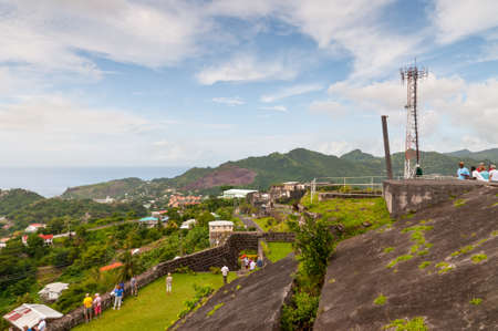 Saint George's, Grenada - December 3, 2011: Tourists visiting the Fort Frederick on December 3, 2011 in Grenada, Caribbean. Constructed by the French in 1779, Fort Frederick was soon used by the British to defend against the French. Itâs the islandâs のeditorial素材