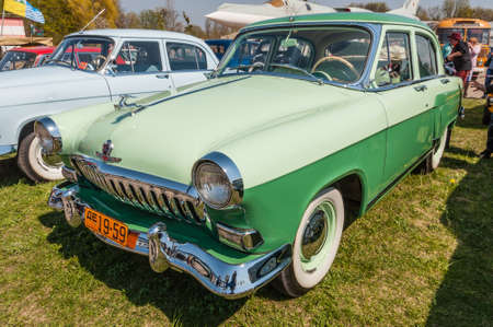 Kyiv, Ukraine - April 26, 2015: The festival "Old Car Fest 2015", showed an old soviet 1959 Volga M-21 vintage model with a deer at April 26, 2015 in Kiev, Ukraine.のeditorial素材
