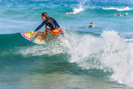 Sydney, Australia - November 26, 2014: A Australian surfer on the crest of a wave, Bondi Beach in the Eastern Suburbs Sydney, New South Wales, Australia.のeditorial素材