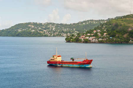 St. George's, Grenada - December 3, 2011: General cargo ship "Anina' built 1970 in the Bay of St. George's, Grenada at December 3, 2011.のeditorial素材