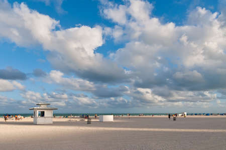 Miami Beach, USA - November 26, 2011. People enjoy their free time on beach in the city of Miami Beach. Miami Beach are popular destinations for both tourists and local residents. Crowds gather to enjoy the bright, warm sunshine.のeditorial素材