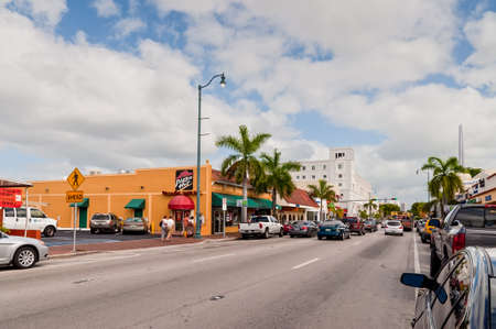Miami, Florida, USA - November 25, 2011: Tourists go toward the popular Calle Ocho, in Little Havana, Miami, Florida, USA. Calle Ocho is the heart of the exiled cuban american community.のeditorial素材