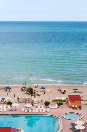Miami Beach, USA - November 23, 2011: People relaxing on the sun on Miami Beach.のeditorial素材