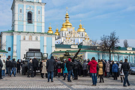 Kiev, Ukraine - February 25, 2015: People visiting the documentary exhibition "Presence. Evidence of the Russian Military Aggression on the territory of Ukraine." Exhibition items also expose the groundless nature of the Russian myth that there is a civilのeditorial素材
