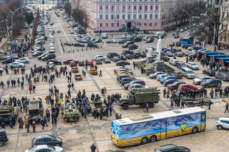 Kiev, Ukraine - February 25, 2015: People visiting the documentary exhibition "Presence. Evidence of the Russian Military Aggression on the territory of Ukraine." Exhibition items also expose the groundless nature of the Russian myth that there is a civilのeditorial素材