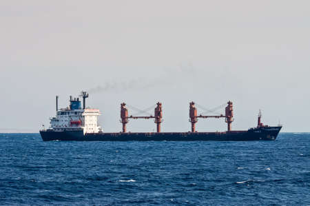 Sharm El Sheikh, Egypt - November 24, 2010: General cargo ship Tykoon II sails along the shore of the Red Sea near Sharm El Sheikh, Egypt at November 24, 2010. Type of vessel: General cargo. Flag: Panama.のeditorial素材