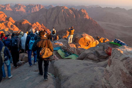 Mount Sinai, Egypt - November 25, 2010:  Pilgrims and tourists on the pathway from the Mount Sinai peak in early morning.のeditorial素材