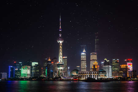 Shanghai, China - October 23, 2013: Shanghai landmark skyline at night city landscape, China. Shanghai has been developed specifically as a new financial district of China.のeditorial素材