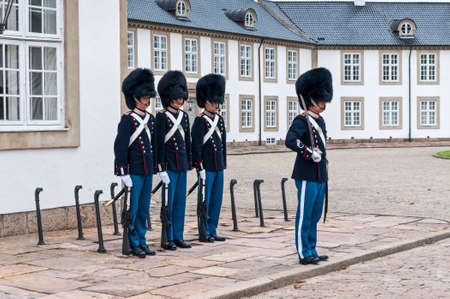 Fredensborg, Denmark - August 6, 2010: Royal guards changing on Fredensborg palace at August 6, 2010 in Fredensborg, Denmark.のeditorial素材