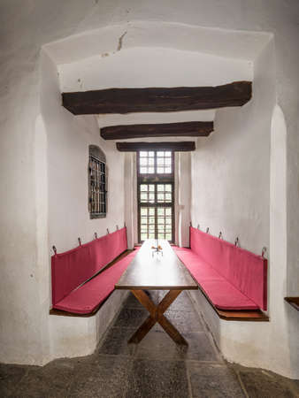 Braubach, Germany - May 23, 2016: Interior of the Marksburg castle (table and bench). It is one of the principal sites of the UNESCO World Heritage Rhine Gorge.のeditorial素材