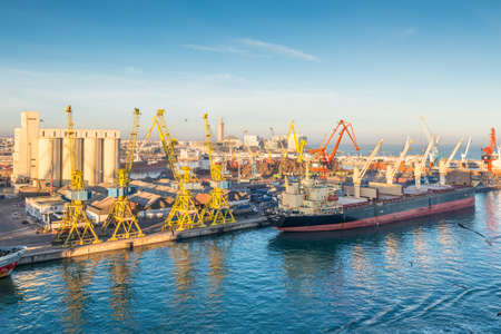 Casablanca, Morocco - December 8, 2016: Cargo vessel Ocean Luck (Bulk Carrier) early in the morning in the seaport of Casablanca, Morocco. The scene with harbor cranes, elevators, ships and export cargoes in the port.のeditorial素材