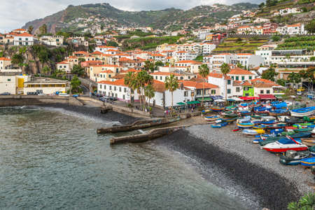 Camara de Lobos, Madeira, Portugal - December 10, 2016: Camara de Lobos near Funchal, Madeira Island in cloudy weather. In this fishing village Winston Churchill spent much time for paining.のeditorial素材