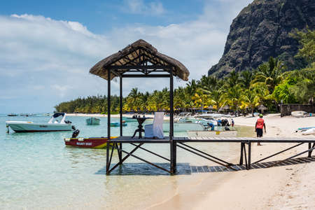 Le Morne, Mauritius - December 7, 2015: A setup for a romantic dinner on the Le Morne Beach, one of the finest beaches in Mauritius and the site of many hotels and tourism facilities.のeditorial素材