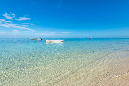 Sand and blue ocean in the Le Morne Beach Mauritius Islandの写真素材
