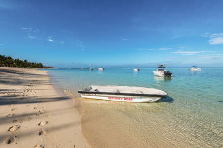 Le Morne, Mauritius - December 11, 2015: A wide-angle view on the Le Morne Beach, one of the finest beaches in Mauritius. Security boat in the foreground.のeditorial素材