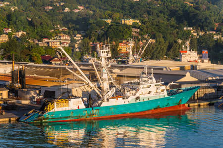 Victoria, Mahe island, Seychelles - December 15, 2015: Modern industrial fishing vessel TORRE GIULIA in the morning sun in the harbor of Port Victoria, Mahe island, Seychelles.のeditorial素材