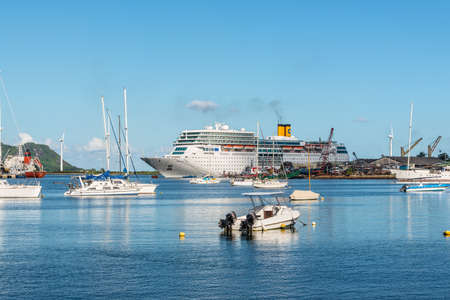 Victoria, Mahe Island, Seychelles - December 16, 2015: Costa Neoromantica Cruise ship and boats in the foreground anchored in Victoria Harbour in Mahe Island, Seychelles, Indian Ocean, Africa.のeditorial素材