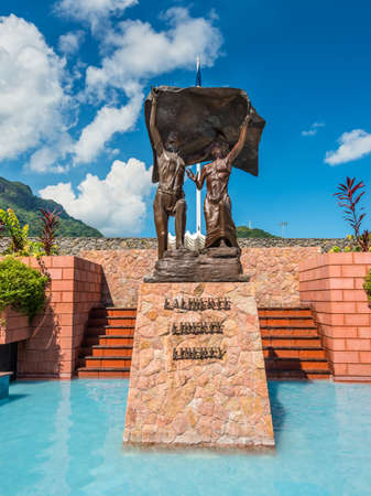 Victoria, Mahe, Seychelles - December 16, 2015: Designed and built by sculptor Tom Bowers, the Liberty Monument commemorates independence from Britain in 1976. Victoria, Mahe island, Seychelles.のeditorial素材