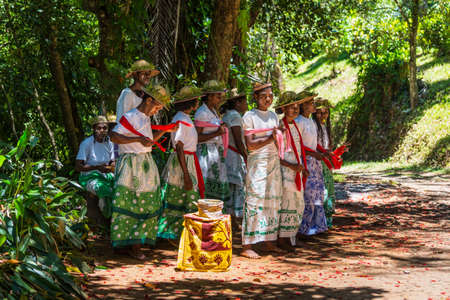 Ivoloina, Madagascar - December 22, 2015: Folk Song Ensemble are preparing to sing in the park of...