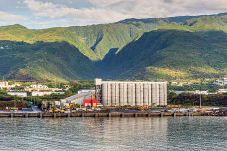 Le Port, Reunion Island, France - December 24, 2015: Large grain elevator (Cereal terminal) on the island of La Reunion, a French overseas department in the south-western Indian Ocean.のeditorial素材