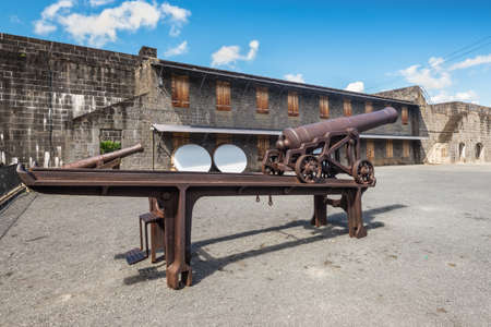 Port Louis, Mauritius - December 25, 2015: Old rusty cannon in the Fort Adelaide in Port Louis, Mauritius. The fortress dates back from the French colonial time.のeditorial素材