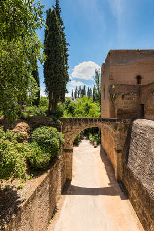 Granada, Spain - May 19, 2014: The bridge over the horse-drawn road in the Alhambra Palace, Granada, Andalusia, Spain.のeditorial素材