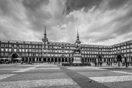 Madrid, Spain - May 22, 2014: Plaza Mayor with statue of King Philips III in Madrid, Spain. Black and white retro style. Architecture and landmark of Madrid.のeditorial素材