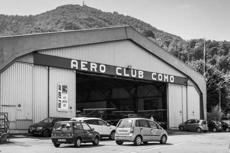 Como, Italy - May 27, 2016: Hangar of the Aero Club Como at water aerodrome of Como lake in Como City, Italy. Black and white photography.のeditorial素材