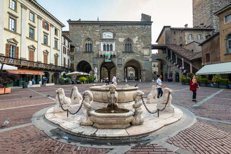 Bergamo, Italy - May 27, 2016: Contarini Fountain in the main city square Piazza Vecchia of Bergamo old town, Italy.のeditorial素材