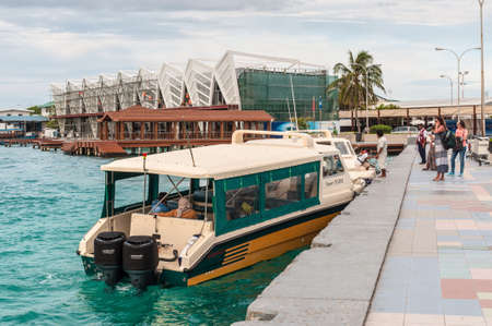 Male, Maldives - November 21, 2017:  Passengers are brought on speed boats to the Ibrahim Nasir International Airport in Male, Maldives.のeditorial素材