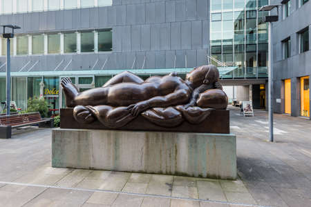 Vaduz, Liechtenstein - May 28, 2016: Bronze sculpture Fernando Botero of a nude woman lying on her back (Resting woman, 1993) in Vaduz, Liechtenstein.のeditorial素材