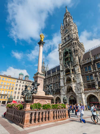 Munich, Germany - May 29, 2016: The Golden statue of the Mariensaule (Column of the Virgin Mary) on the Marienplatz in Munich, Bavaria, Germany.のeditorial素材