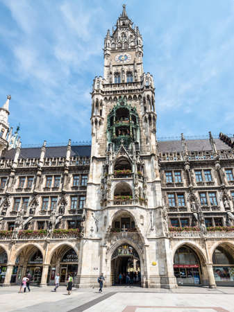 Munich, Germany - May 29, 2016: Tower clock of the Marienplatz town hall architecture in location famous place square in European city Munich, Germany, Europe.のeditorial素材