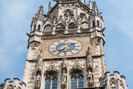 Munich, Germany - May 29, 2016: Clock tower of New Town Hall in famous place Marienplatz square in European city Munich, Germany, Europe.のeditorial素材