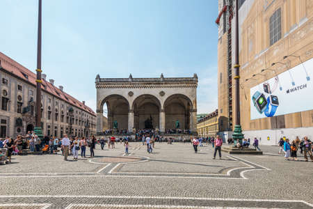 Munich, Germany - May 29, 2016: People walking in front of Field marshall's hall (Feldherrnhalle), a monumental loggia on the Odeonsplatz in Munich, Bavaria, Germany.のeditorial素材