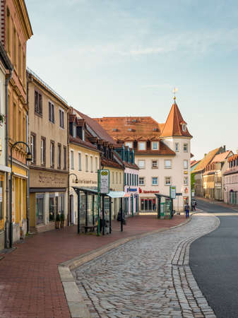 Wilsdruff, Germany - May 30, 2016: Street view with shops, cafe and residential buildings in the early morning in the Market Square of Wilsdruff (Marktplatz), near Dresden, Saxony, Germany.のeditorial素材