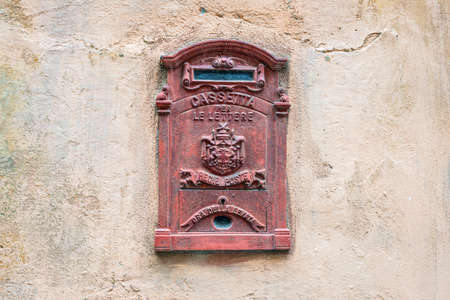 Savona, Italy - December 2, 2016: Italian old vintage decorative mailbox in a wall in Savona, Liguria, Italy.のeditorial素材