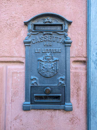 Savona, Italy - December 2, 2016: Italian old vintage decorative mailbox in a wall in Savona, Liguria, Italy.のeditorial素材