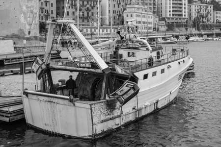Savona, Italy - December 2, 2016: The Fishing Vessel Padre Pio I in harbor at the Ligurian sea port in Savona, Italy. Black and white photography.のeditorial素材