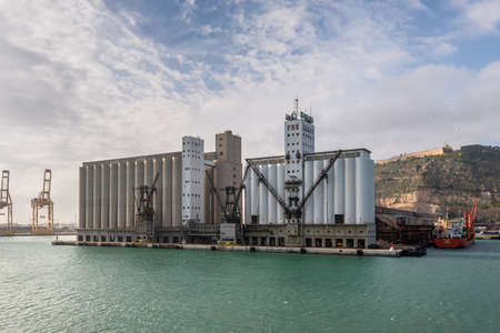 Barcelona, Spain - December 5, 2016: View of the Ergransa grain silos in Barcelona, Spain. Many...